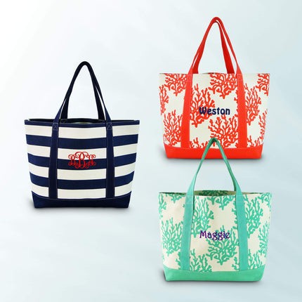 Three tote bags with different designs and colors on a light blue background.