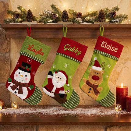 Fleece and knit Christmas stockings with snowman, Santa and Calibou designs for wholesale