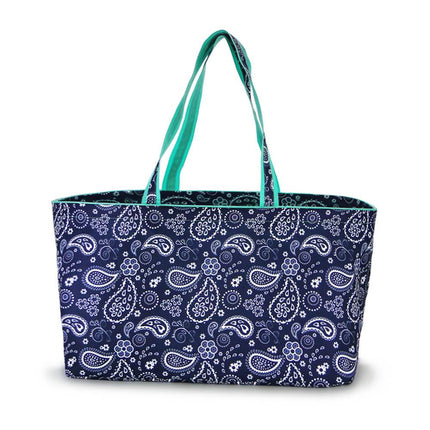 Large navy and white paisley printed waterproof carryall tote bag from Red To Purple Wholesale, ideal for shopping and beach use.