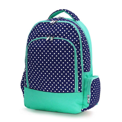 Classic school backpack from Red To Purple Wholesale featuring a navy and white polka dot print with mint trim, ideal for students