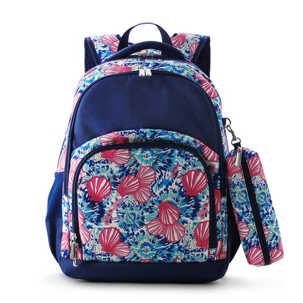 Wholesale Comfort School Backpack from Red To Purple Wholesale, featuring bloom and pink shells printed fabric with navy trims, ideal for everyday use.